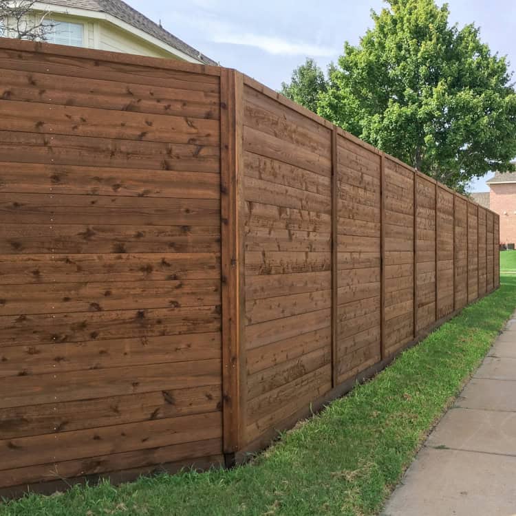 Bedford fence company dark stained wood fence