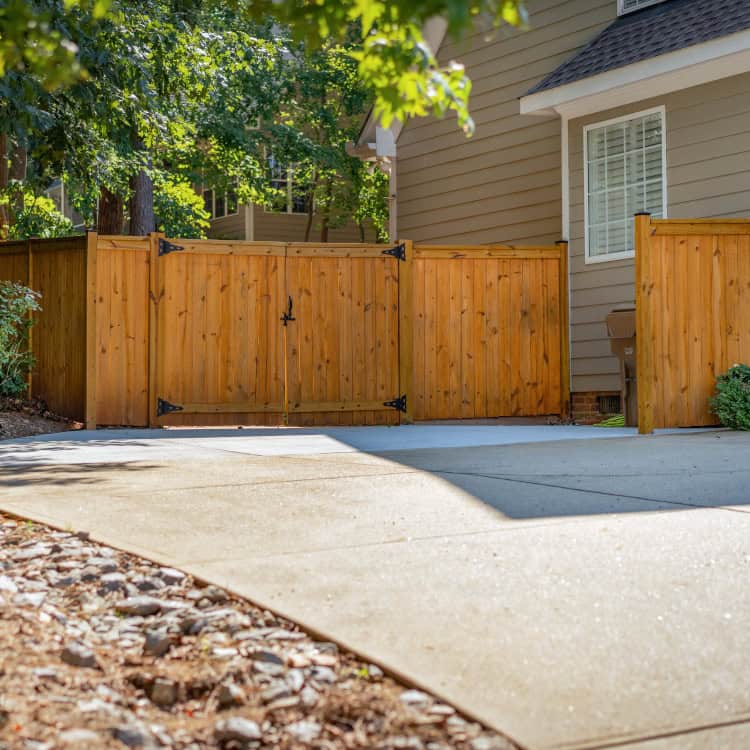 Charleston fence installation stained wood fence with gate