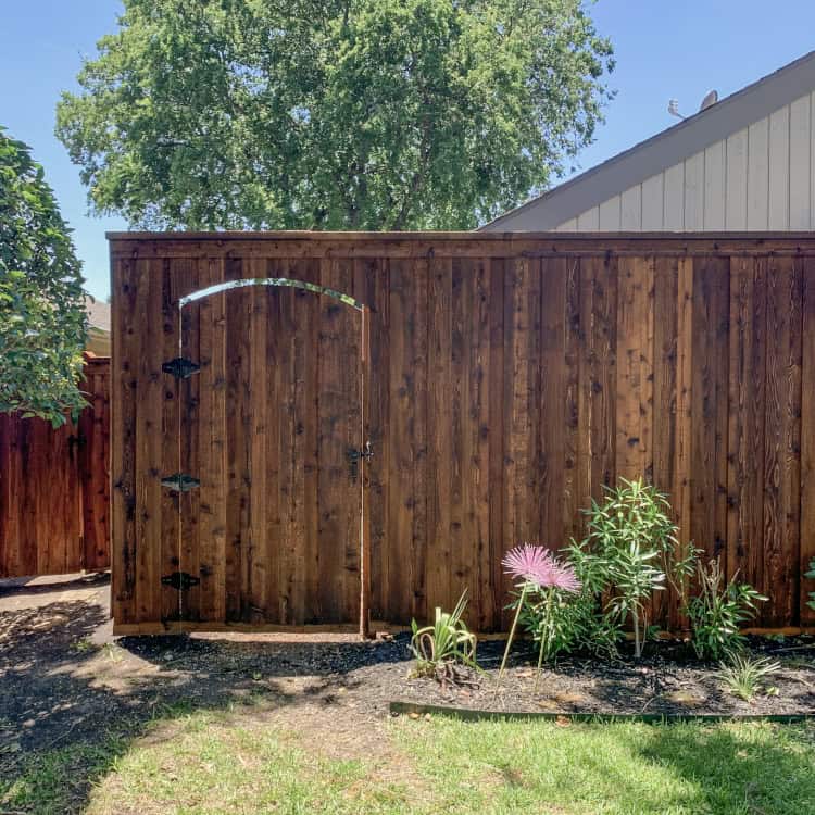 fence builder Arlington dark stained wood fence with gate