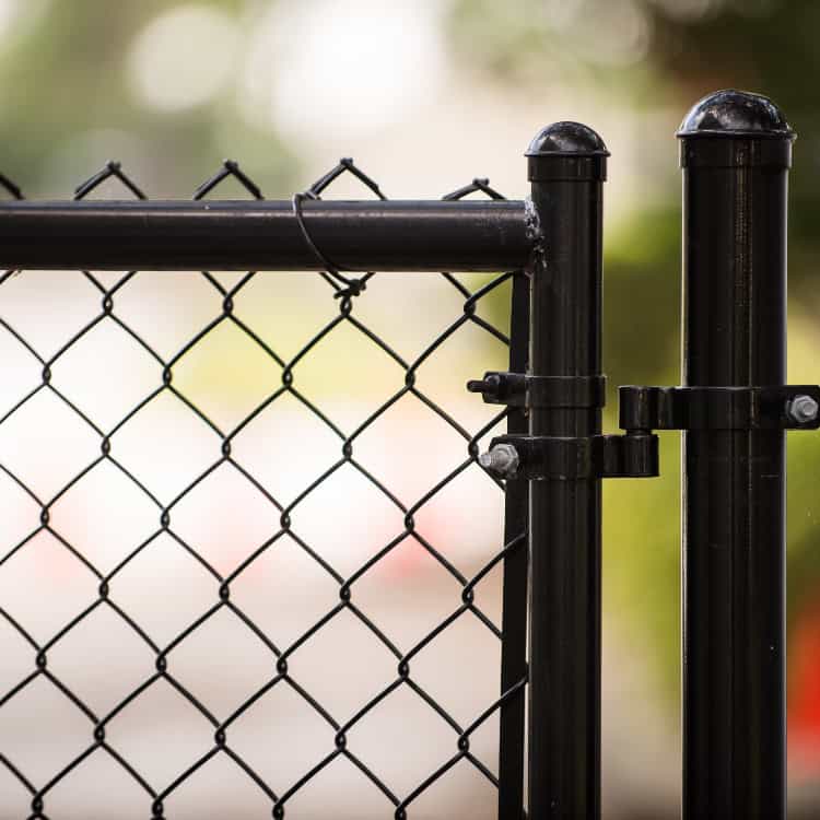 Zoomed in black chain link fence