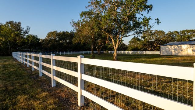 ranch style wooden fence with inset wire