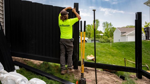 fence install on sloped lot